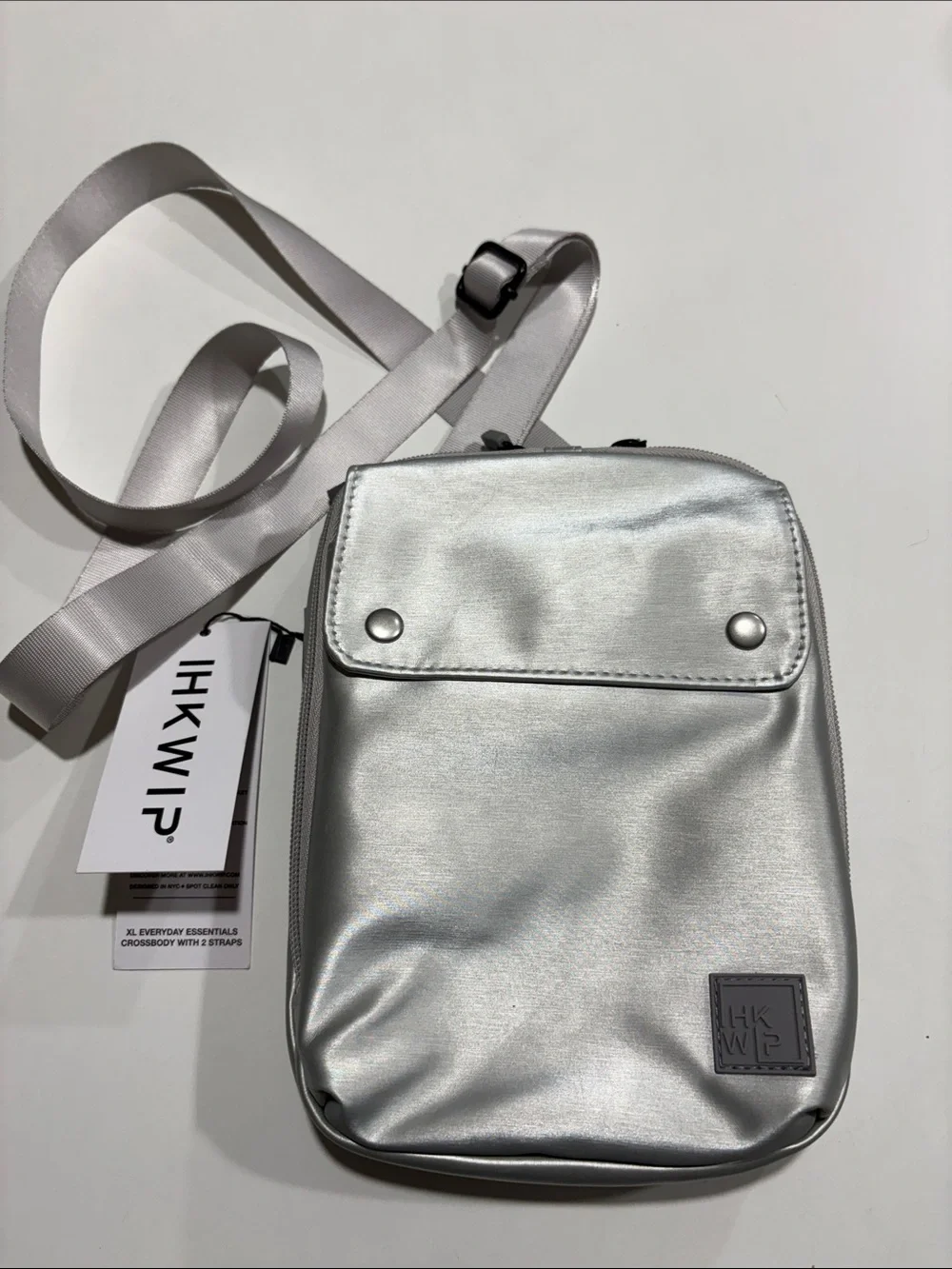 Ikwhip Metallic Matte Silver Everyday Crossbody Bag. Lots of pockets! Web strap